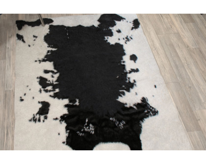 BLNK Barstow Collection Faux Cowhide Print Area Rug with Polyester Backing - Black, 3'W x 5'L