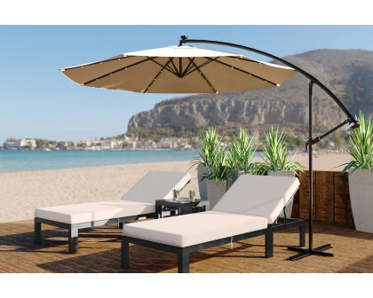 LeisureMod Chelsea Modern Outdoor Black Chaise Lounge Chair with Side Table and Cushions - Beige