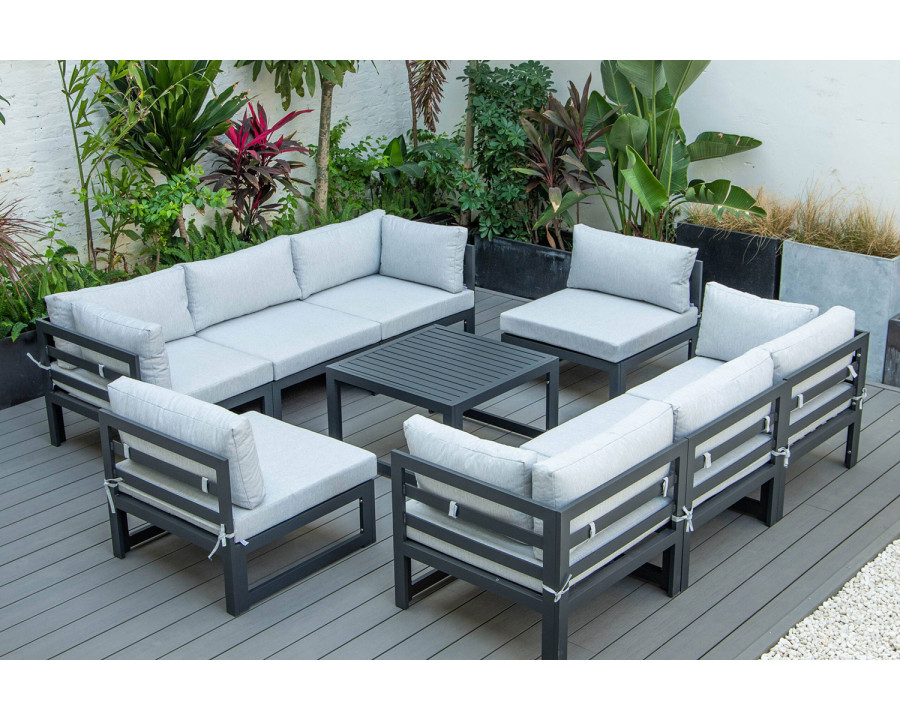 LeisureMod Chelsea 9-Piece Patio Sectional with Coffee Table Black Aluminum with Cushions - Gray