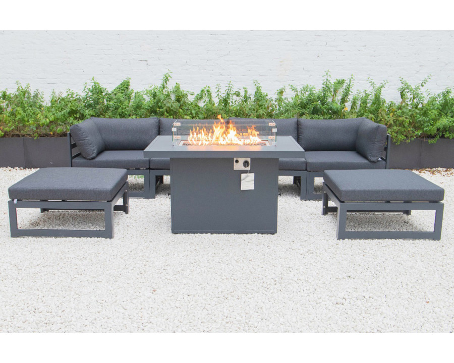 LeisureMod Chelsea 7-Piece Patio Ottoman Sectional and Fire Pit Table Black Aluminum with Cushions - Black