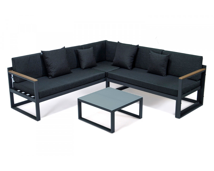 LeisureMod Chelsea Black Sectional with Adjustable Headrest and Coffee Table with Cushions - Black