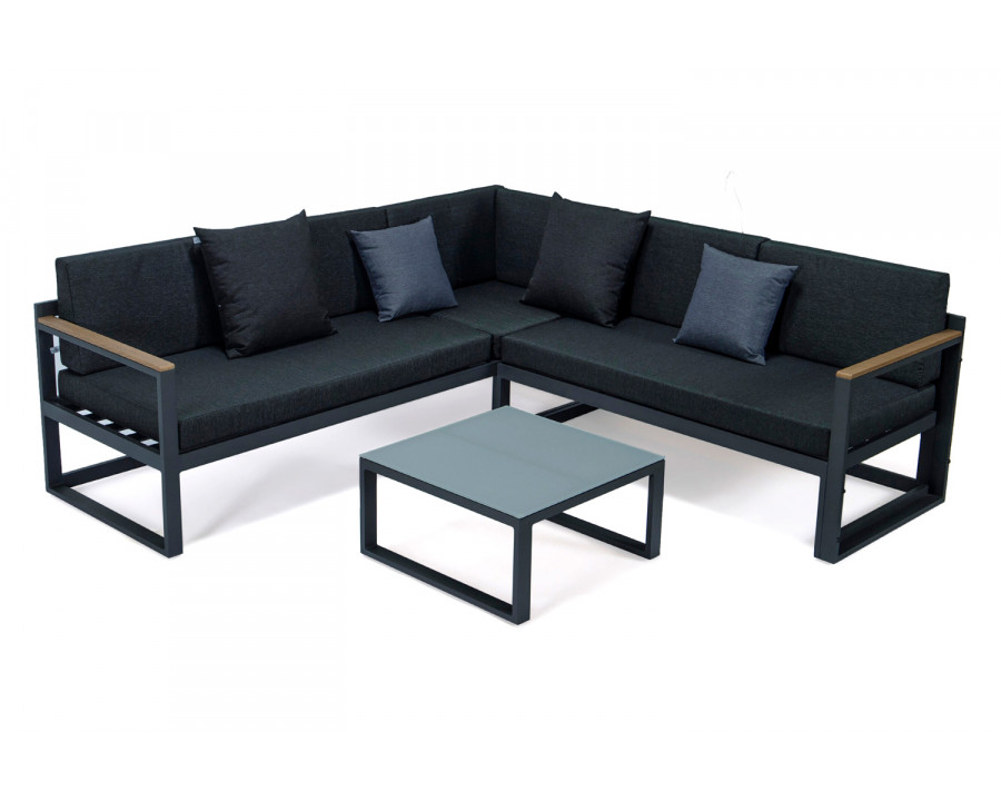 LeisureMod Chelsea Black Sectional with Adjustable Headrest and Coffee Table with Two Tone Cushions - Black