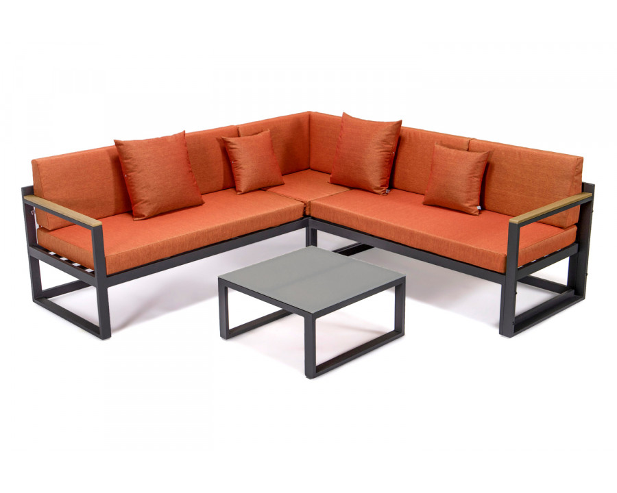 LeisureMod Chelsea Black Sectional with Adjustable Headrest and Coffee Table with Cushions - Orange