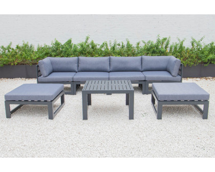 LeisureMod Chelsea 7-Piece Patio Ottoman Sectional and Coffee Table Set Black Aluminum with Cushions