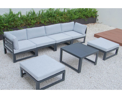 LeisureMod Chelsea 7-Piece Patio Ottoman Sectional and Coffee Table Set Black Aluminum with Cushions - Light Gray