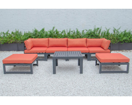 LeisureMod Chelsea 7-Piece Patio Ottoman Sectional and Coffee Table Set Black Aluminum with Cushions