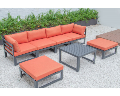 LeisureMod Chelsea 7-Piece Patio Ottoman Sectional and Coffee Table Set Black Aluminum with Cushions - Orange