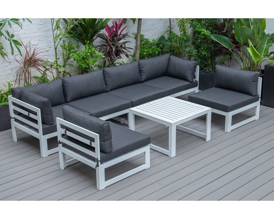 LeisureMod Chelsea 7-Piece Patio Sectional and Coffee Table Set In White Aluminum with Cushions - Black