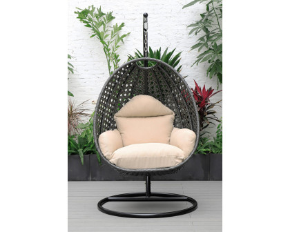 LeisureMod Charcoal Wicker Hanging Single Egg Swing Chair with Cushions - Beige