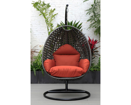 LeisureMod Charcoal Wicker Hanging Single Egg Swing Chair with Cushions - Cherry