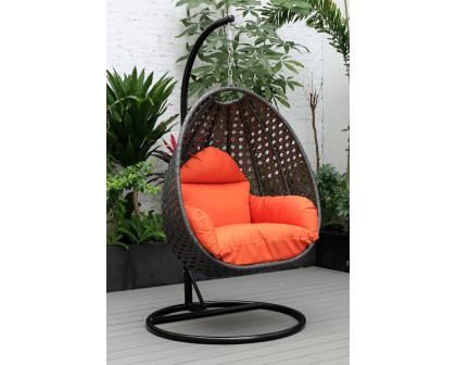 LeisureMod Charcoal Wicker Hanging Single Egg Swing Chair with Cushions - Orange