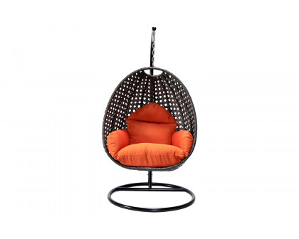 LeisureMod Charcoal Wicker Hanging Single Egg Swing Chair with Cushions - Orange