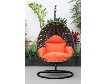 LeisureMod Charcoal Wicker Hanging Single Egg Swing Chair with Cushions - Orange