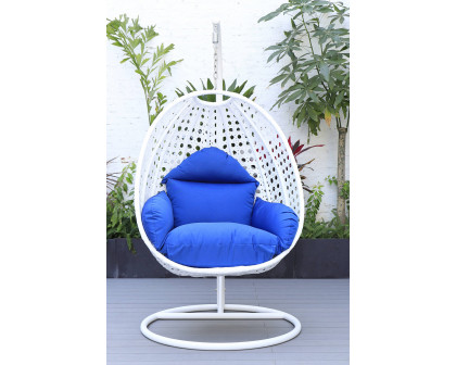 LeisureMod White Wicker Hanging Single Egg Swing Chair with Cushions - Blue