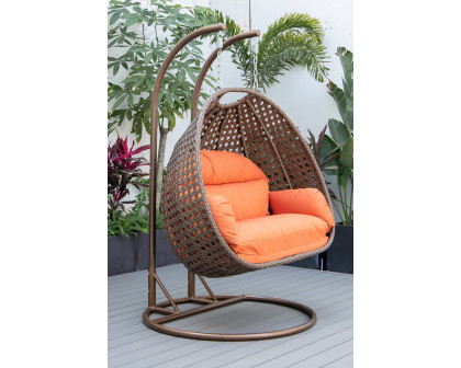 LeisureMod Mendoza Dark Brown Wicker Hanging 2 Person Egg Swing Chair - Orange