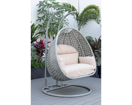 LeisureMod Mendoza Light Gray Wicker Hanging 2 Person Egg Swing Chair with Cushions - Beige