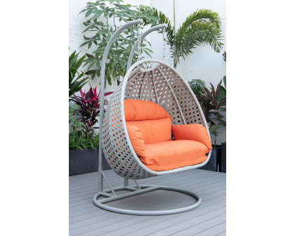 LeisureMod Mendoza Light Gray Wicker Hanging 2 Person Egg Swing Chair with Cushions - Orange