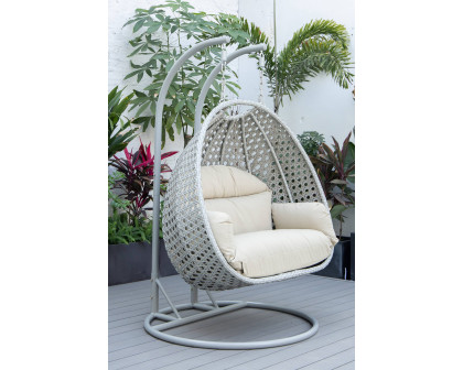 LeisureMod Mendoza Light Gray Wicker Hanging 2 Person Egg Swing Chair with Cushions - Taupe