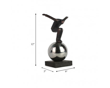 Sagebrook - 12" Metal Balancing Man On Sphere in Bronze