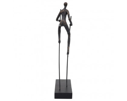 Sagebrook - 15" Resin Man On Stilts in Bronze