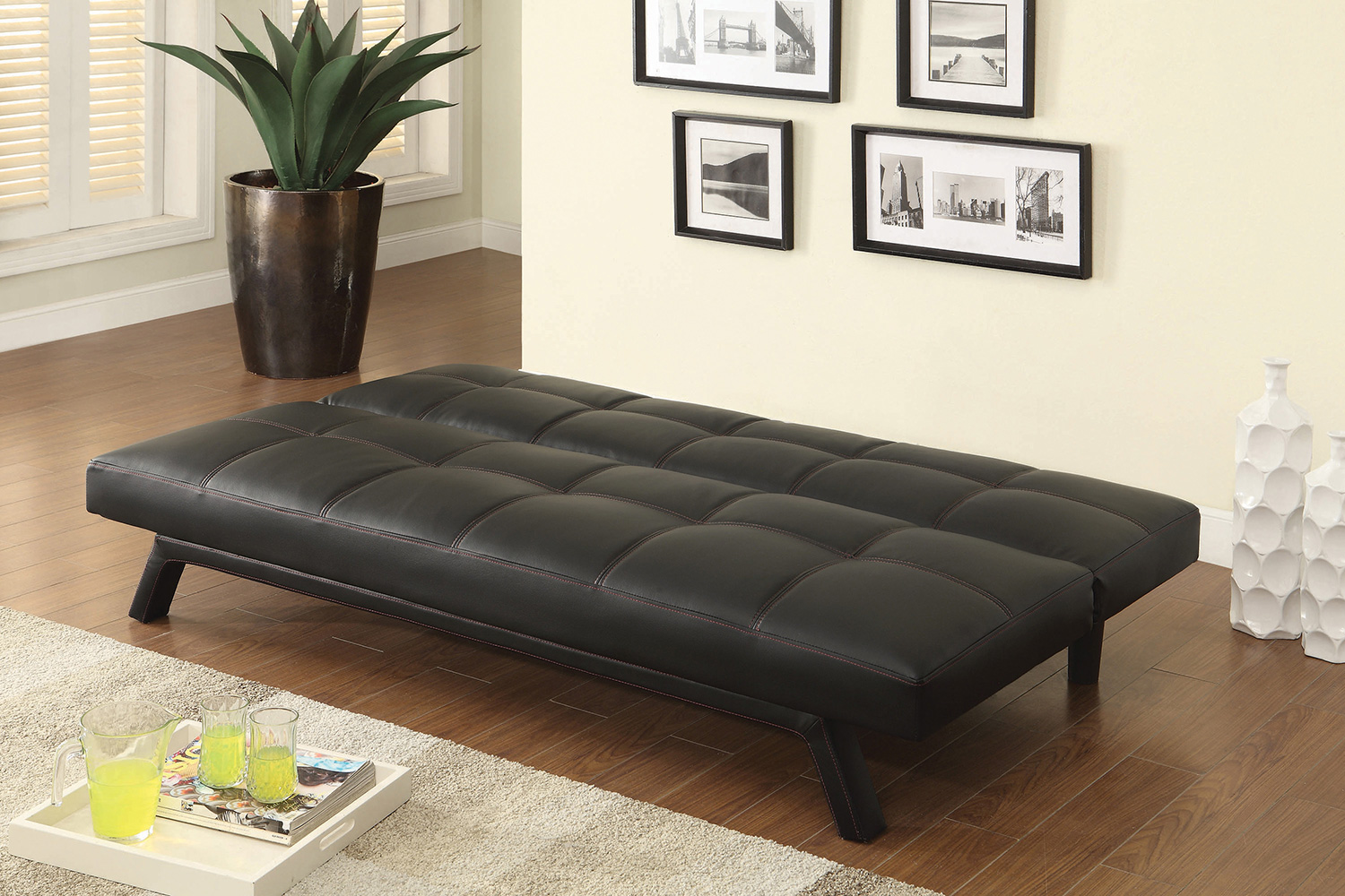 Coaster - Corrie Biscuit-Tufted Upholstered Sofa Bed in Black