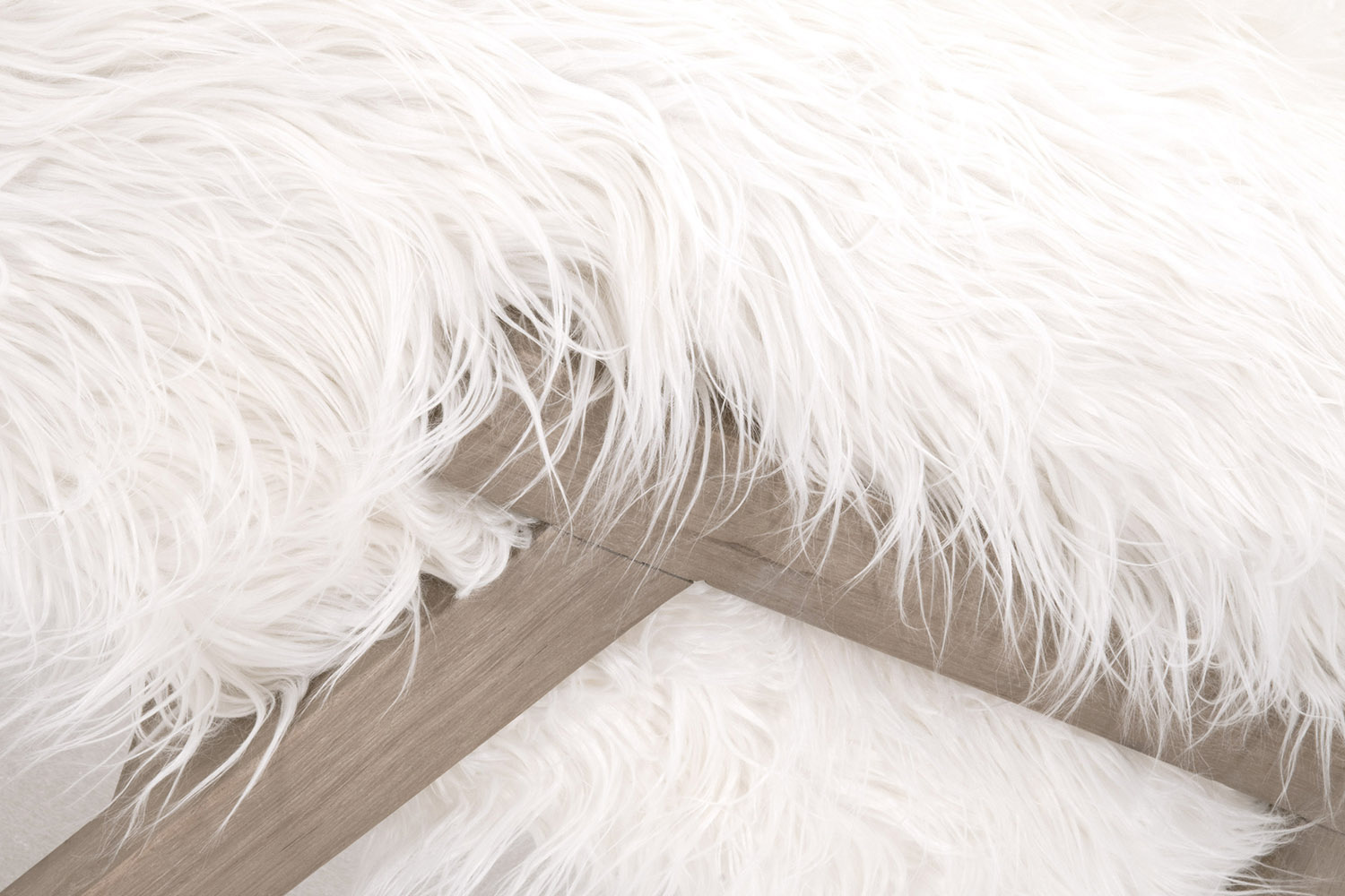 Essentials - Bella Antique Tibet Ottoman in White Fur