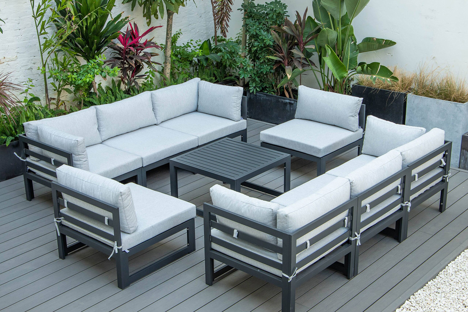 LeisureMod Chelsea 9-Piece Patio Sectional with Coffee Table Black Aluminum with Cushions