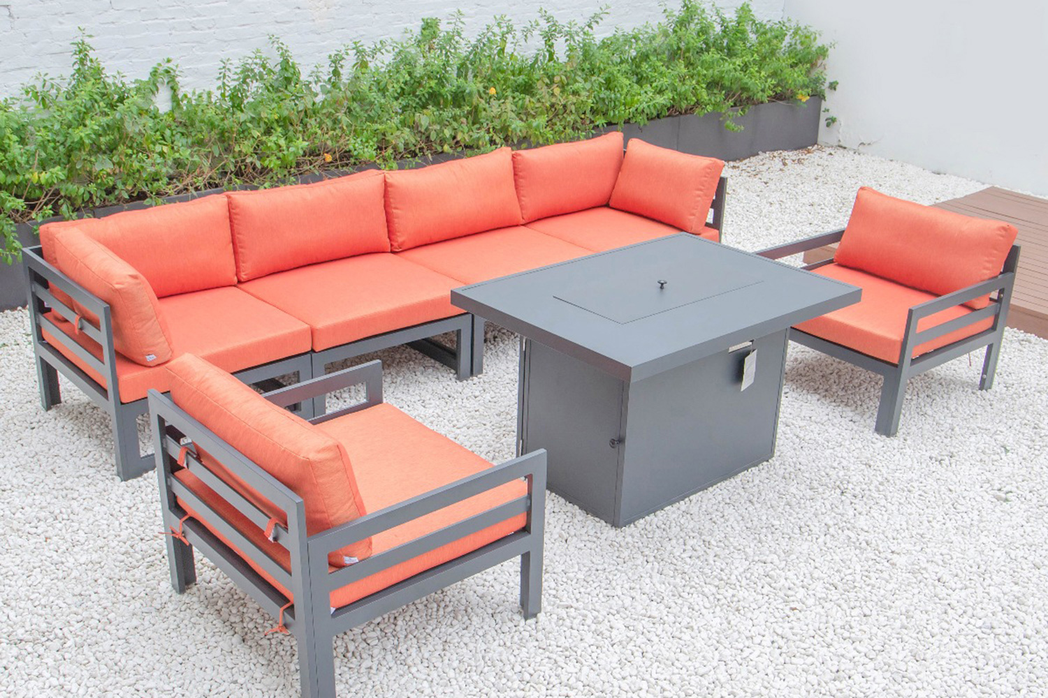 LeisureMod Chelsea 7-Piece Patio Sectional with 2 Arm Chairs and Fire Pit Table Black Aluminum with Cushions - Orange