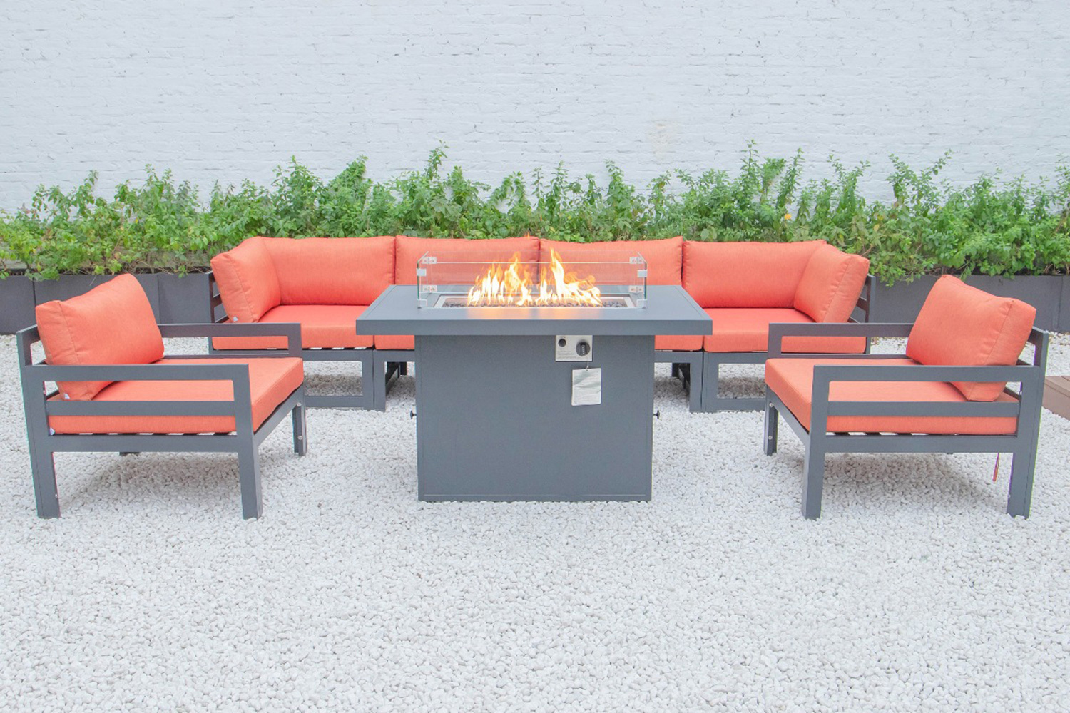 LeisureMod Chelsea 7-Piece Patio Sectional with 2 Arm Chairs and Fire Pit Table Black Aluminum with Cushions - Orange