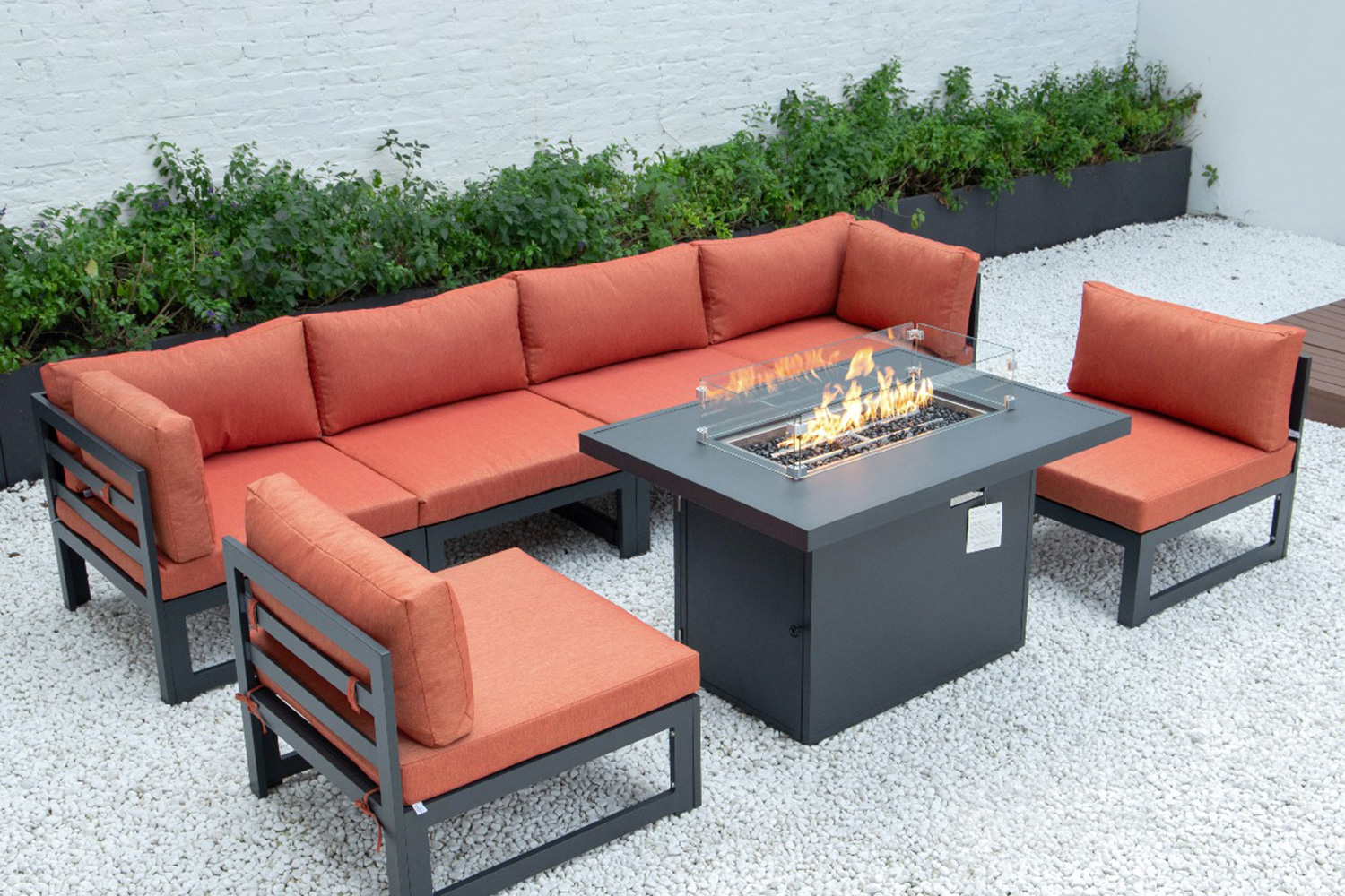 LeisureMod Chelsea 7-Piece Patio Sectional and Fire Pit Table Black Aluminum with Cushions - Orange