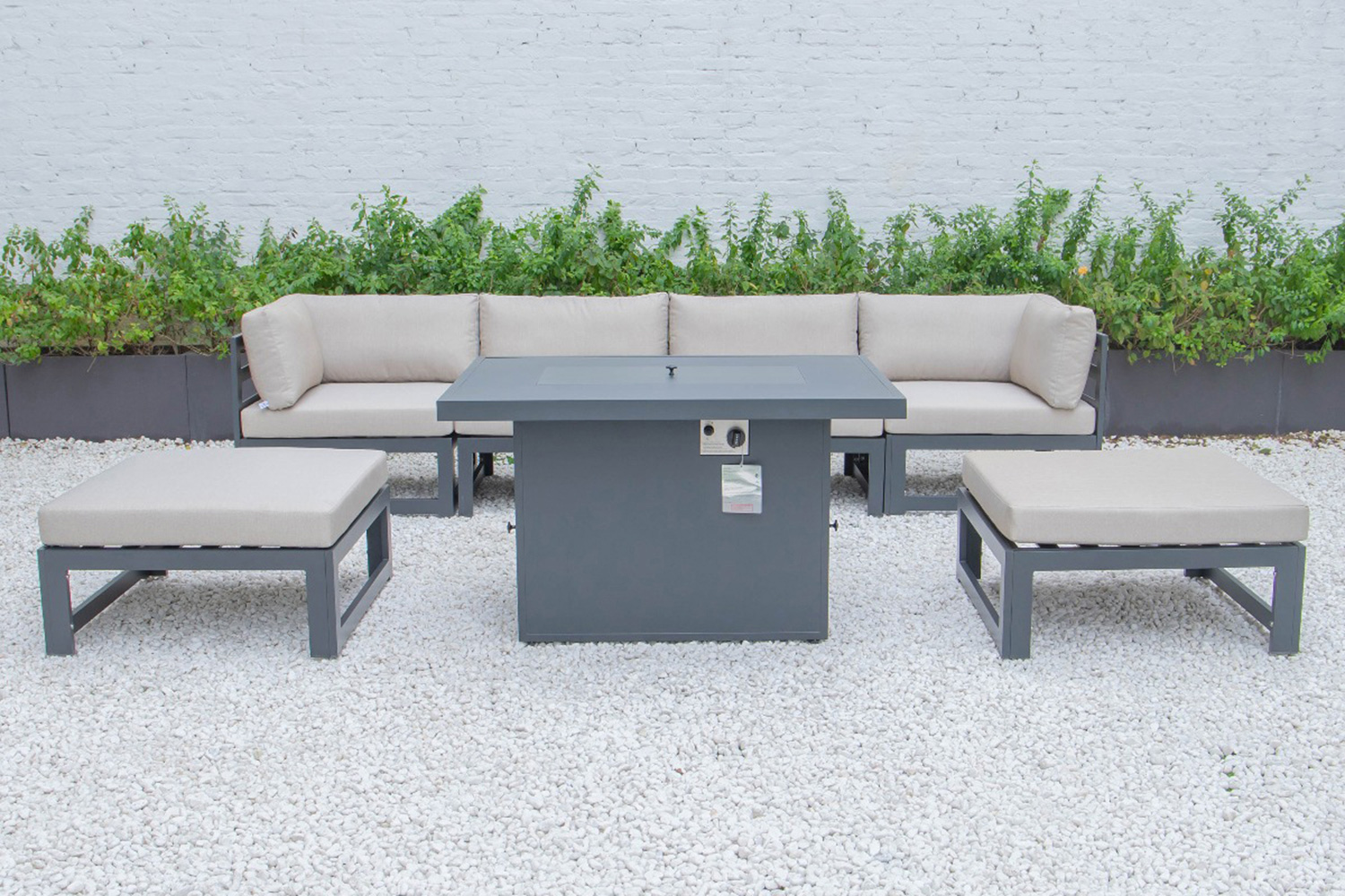 LeisureMod Chelsea 7-Piece Patio Ottoman Sectional and Fire Pit Table Black Aluminum with Cushions - Beige