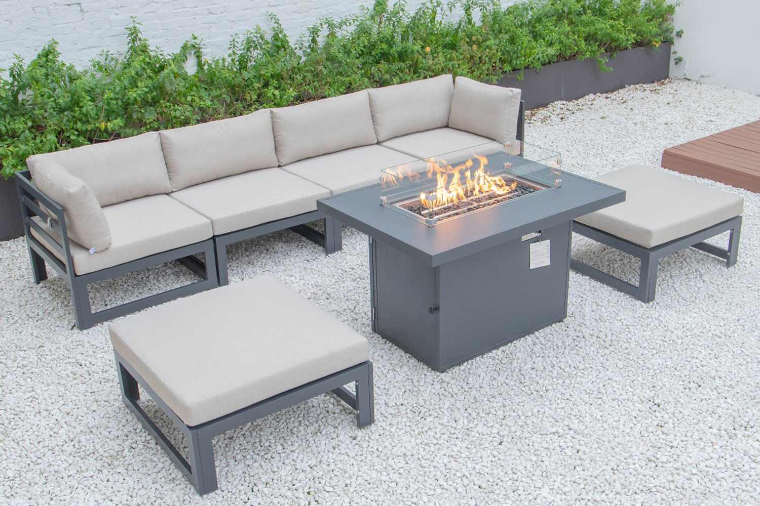 LeisureMod Chelsea 7-Piece Patio Ottoman Sectional and Fire Pit Table Black Aluminum with Cushions - Beige