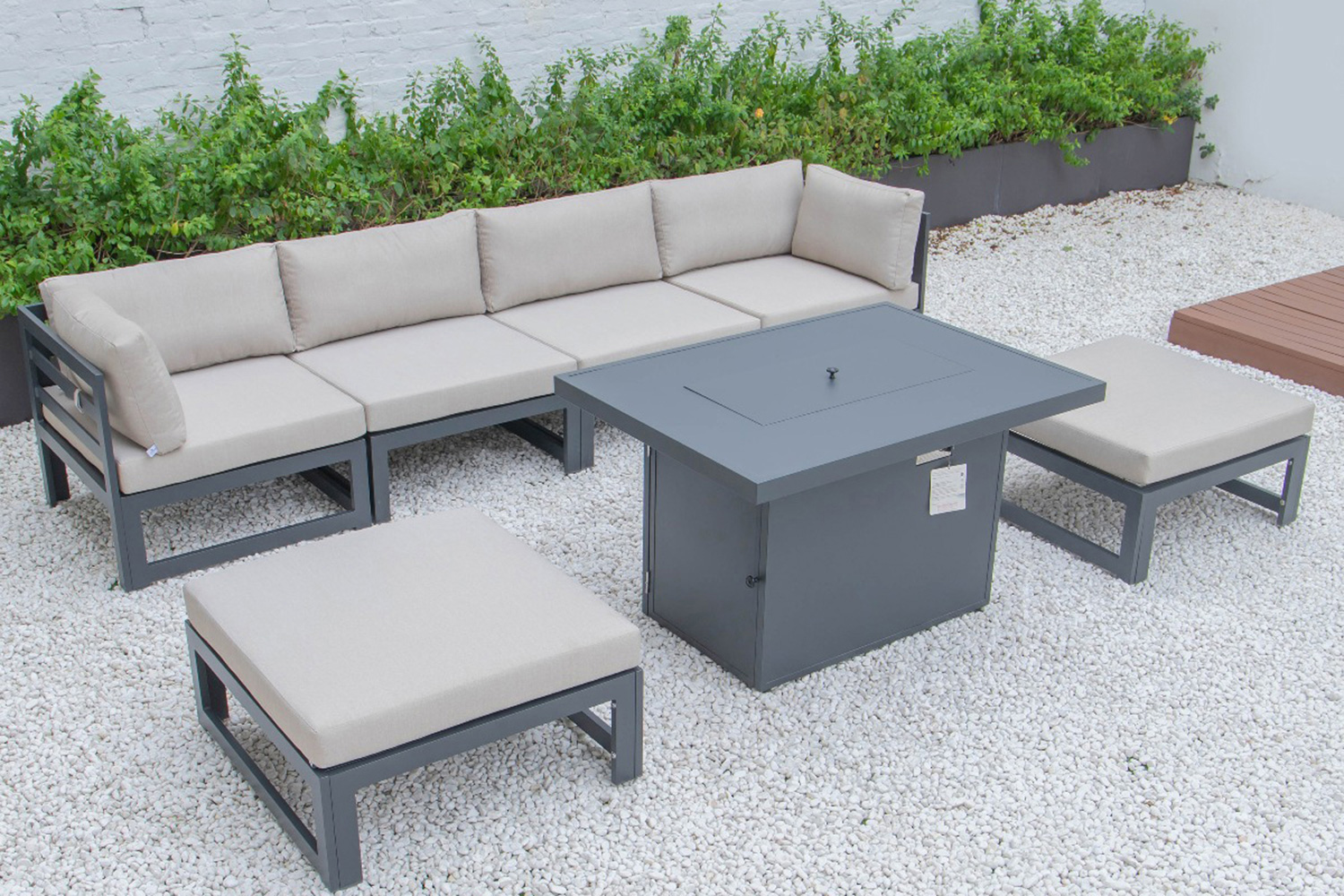 LeisureMod Chelsea 7-Piece Patio Ottoman Sectional and Fire Pit Table Black Aluminum with Cushions - Beige