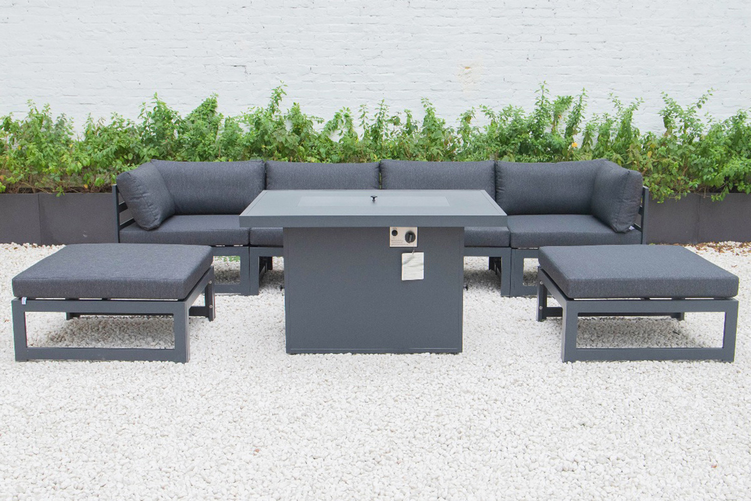 LeisureMod Chelsea 7-Piece Patio Ottoman Sectional and Fire Pit Table Black Aluminum with Cushions - Black