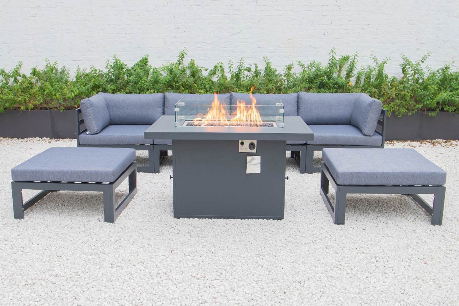 LeisureMod Chelsea 7-Piece Patio Ottoman Sectional and Fire Pit Table Black Aluminum with Cushions