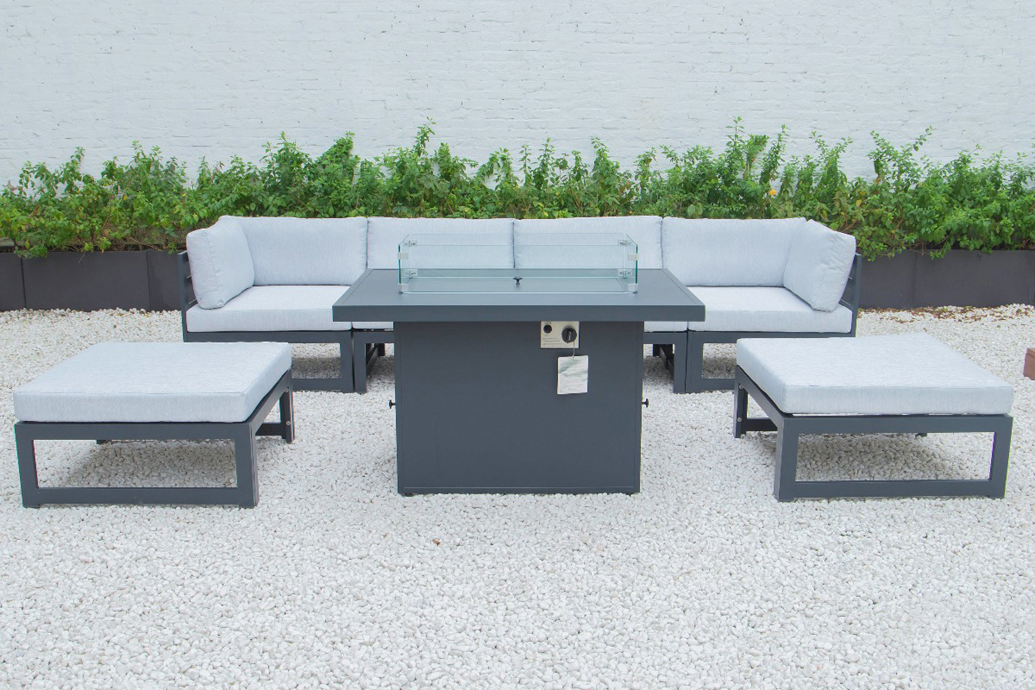 LeisureMod Chelsea 7-Piece Patio Ottoman Sectional and Fire Pit Table Black Aluminum with Cushions - Light Gray