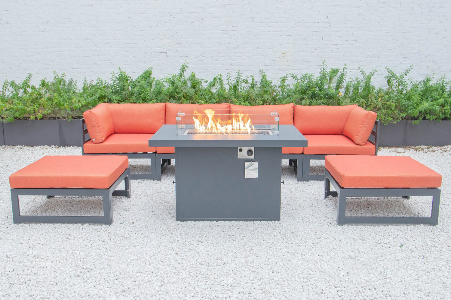 LeisureMod Chelsea 7-Piece Patio Ottoman Sectional and Fire Pit Table Black Aluminum with Cushions