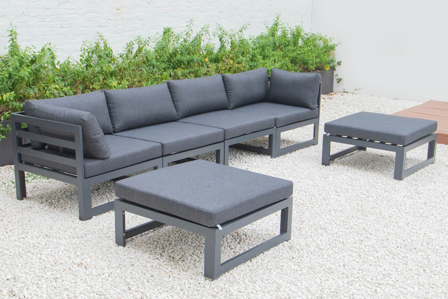 LeisureMod Chelsea 6-Piece Patio Ottoman Sectional Black Aluminum with Cushions - Black