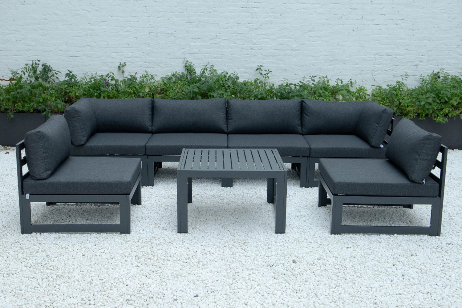 LeisureMod Chelsea 7-Piece Patio Sectional and Coffee Table Set Black Aluminum with Cushions - Black