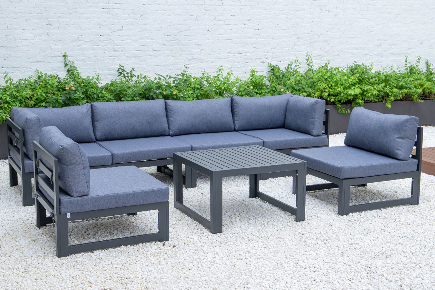 LeisureMod Chelsea 7-Piece Patio Sectional and Coffee Table Set Black Aluminum with Cushions