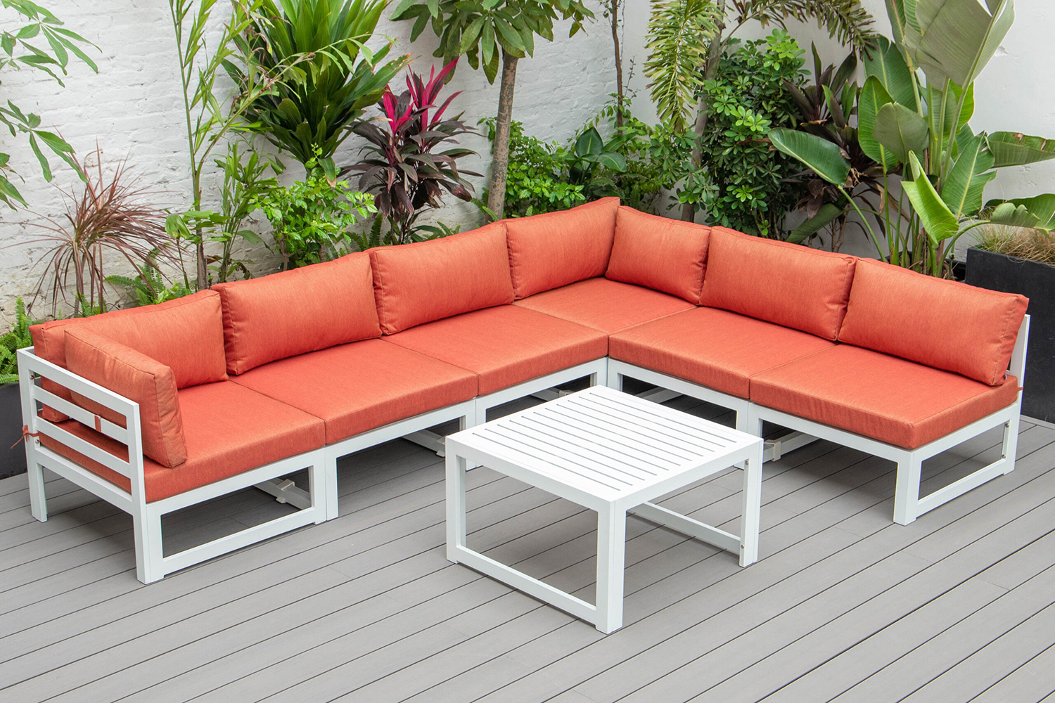 LeisureMod Chelsea 7-Piece Patio Sectional and Coffee Table Set In White Aluminum with Cushions - Orange