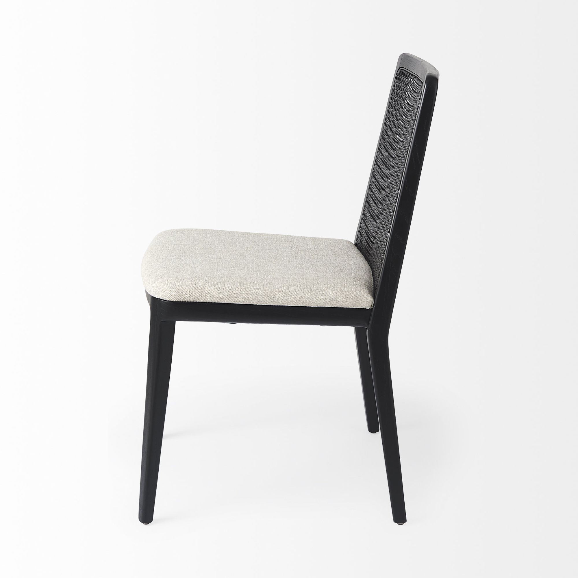 Mercana Clara Armless Dining Chair with Cream Fabric Seat and Cane Back - Black