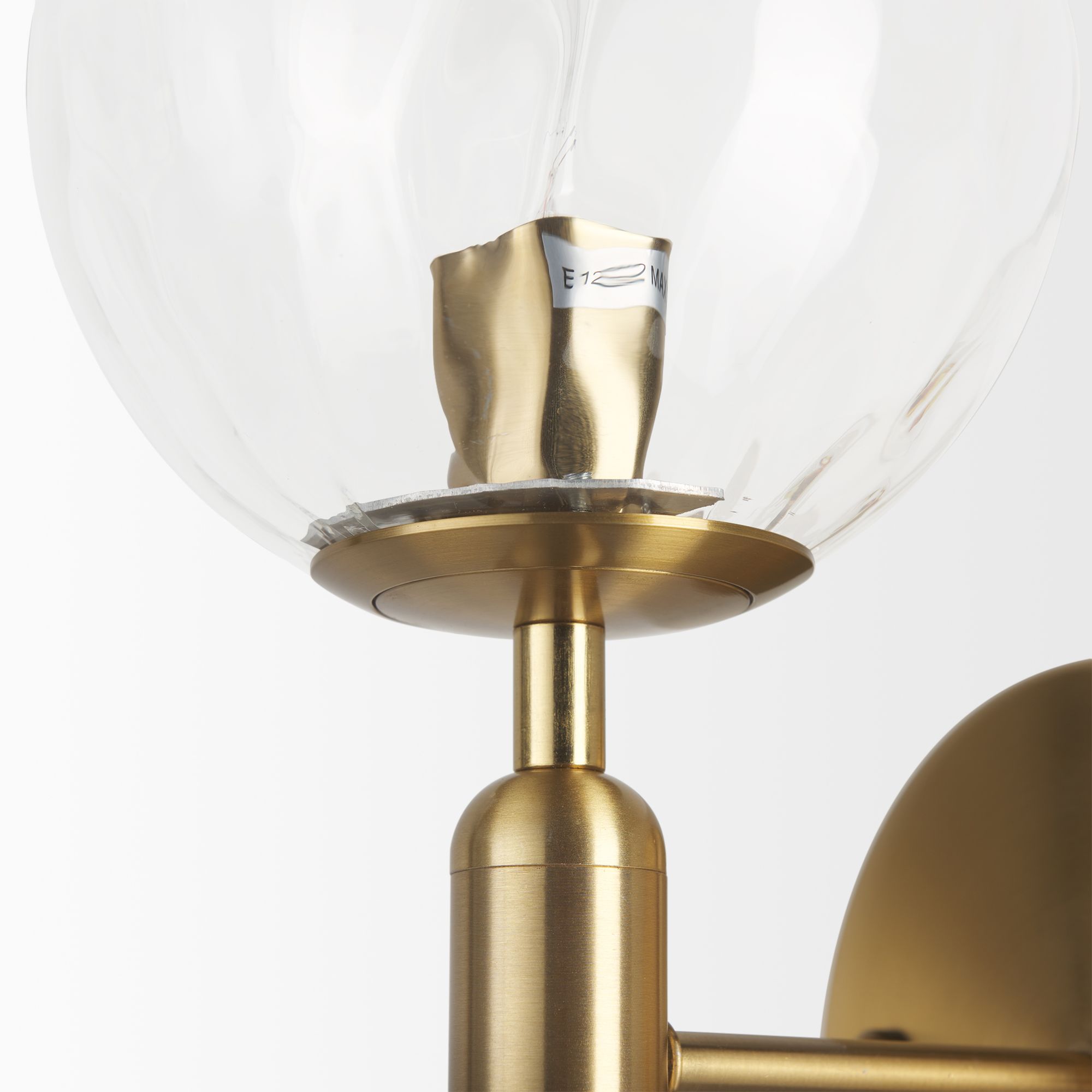 Mercana - Britton Gold Metal with Clear Glass Globe 1-Light Wall Sconce