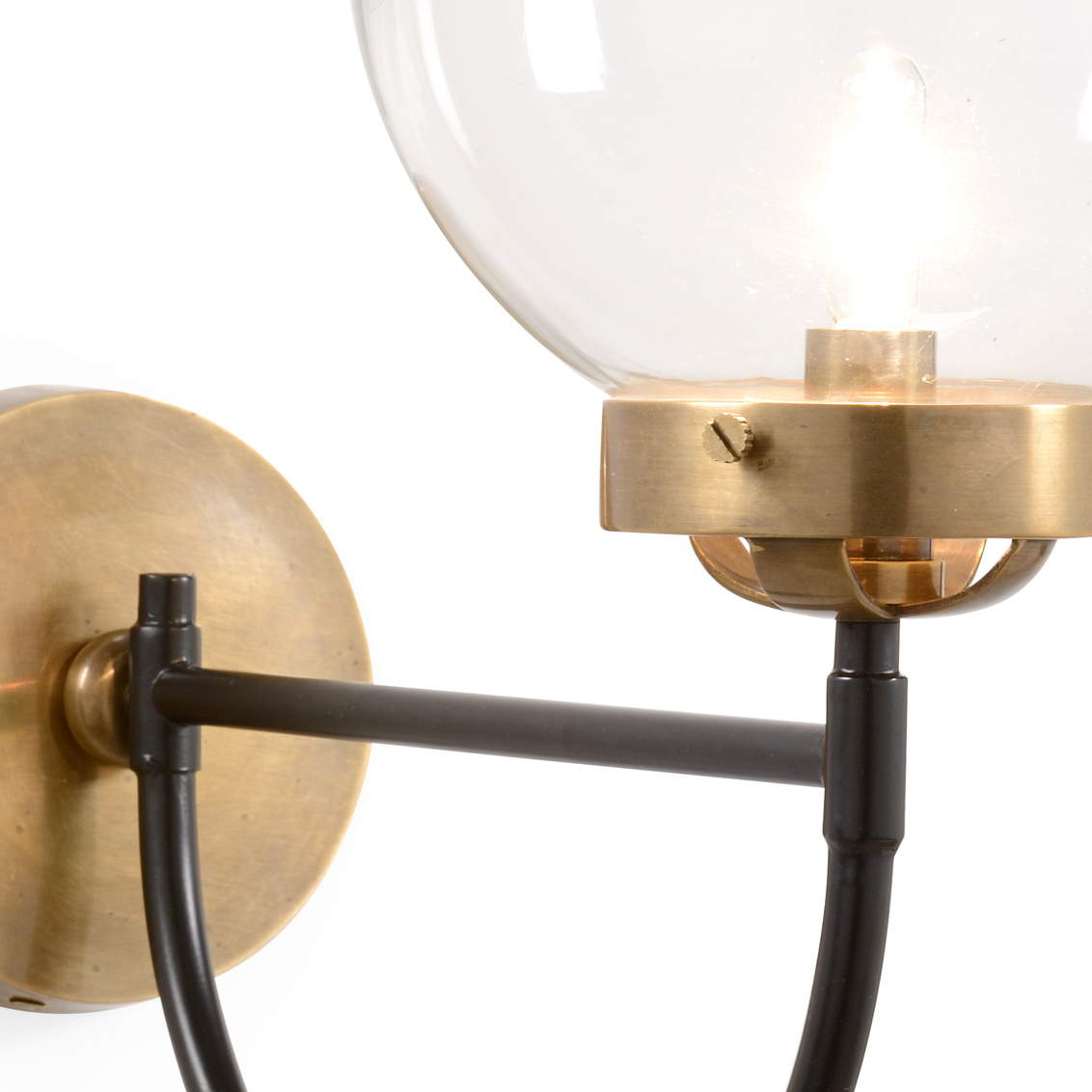 Wildwood - Bistro Sconce in Antique/Black/Clear, Brass